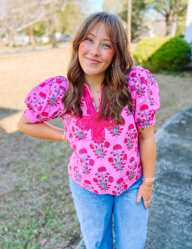 Pink floral blouse with puff sleeves